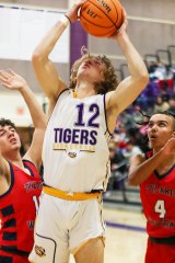 Lemoore's Riley Bermke taking a shot against Tulare Western in Friday's game in the LHS Event Center. LHS won 67-53.